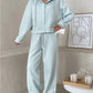 Pale aqua cyan zip front hooded sweatshirt and wide leg trousers set, Cyan color, worn by a model, the Size XL option