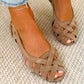 Cut out suede sandal with open sides and a closed low heel