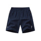 Quick Dry Sports Shorts | scale reference with hand