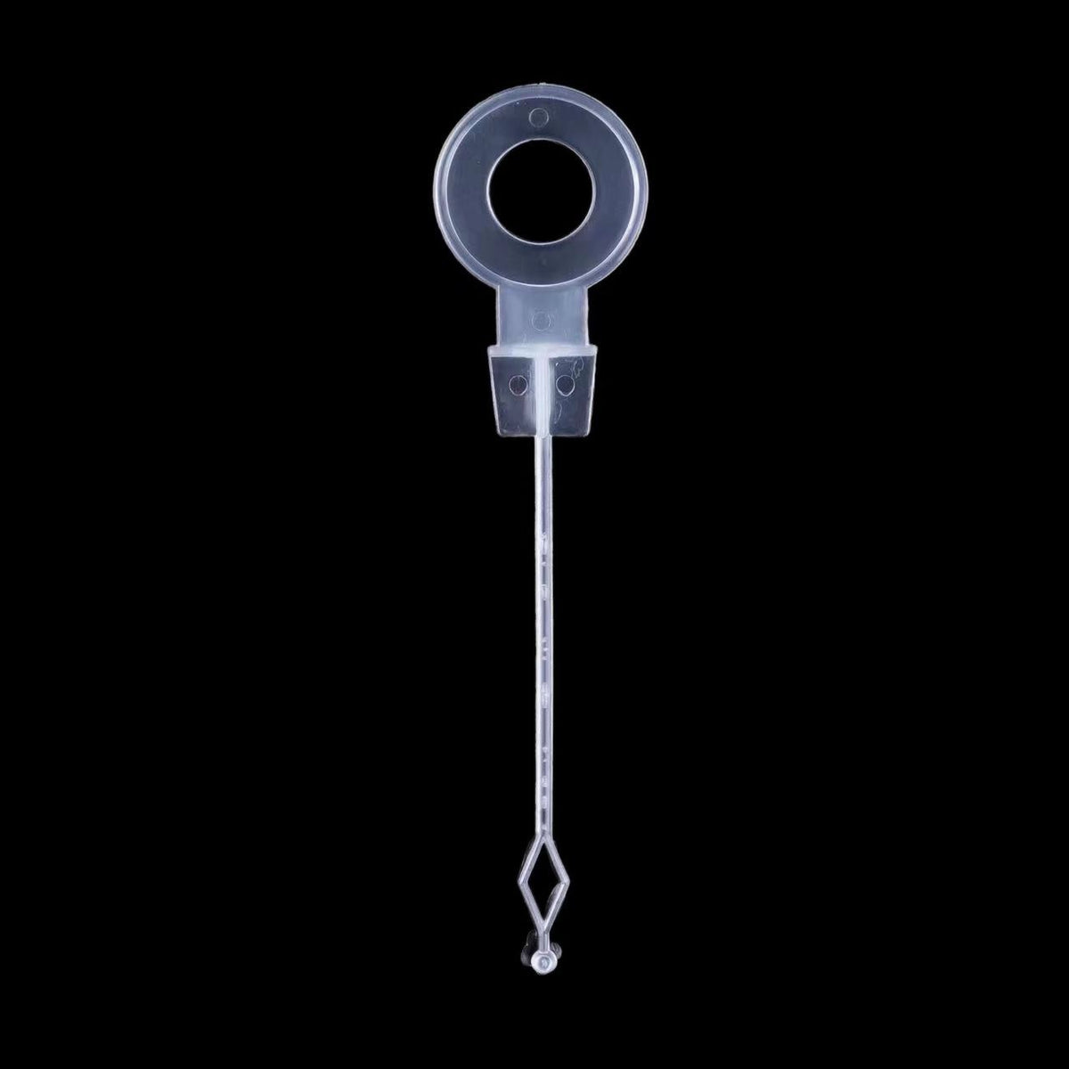 Anti-Clog Rod option: clear plug ring on a thin rod with a pin and a loop on a black background