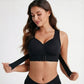 Black seamless support bra laid flat to show the racerback shape