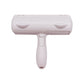 Option White: pet hair roller with a white head and a white handle with two thumb grooves on a white background