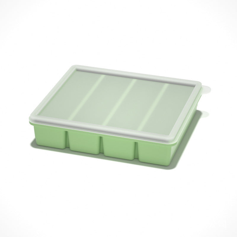 Flexible platinum silicone ice cube tray shown stacked in a freezer for portioning purees