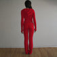 Front view of the fitted knit top and matching knit trousers