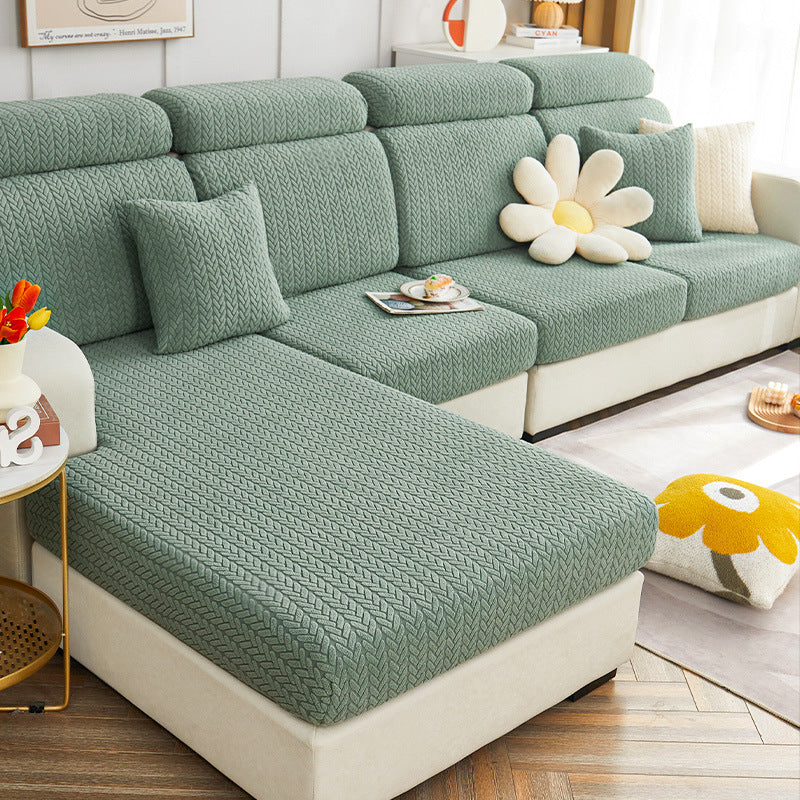 Jacquard sofa cover wrapping a backrest cushion on a sectional