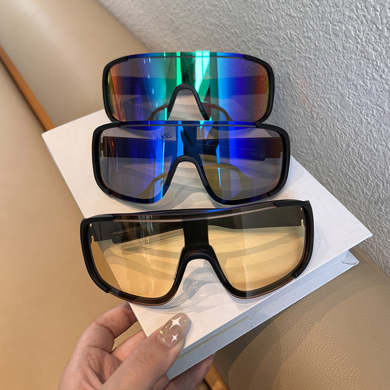 Front view of wraparound sports sunglasses on white background