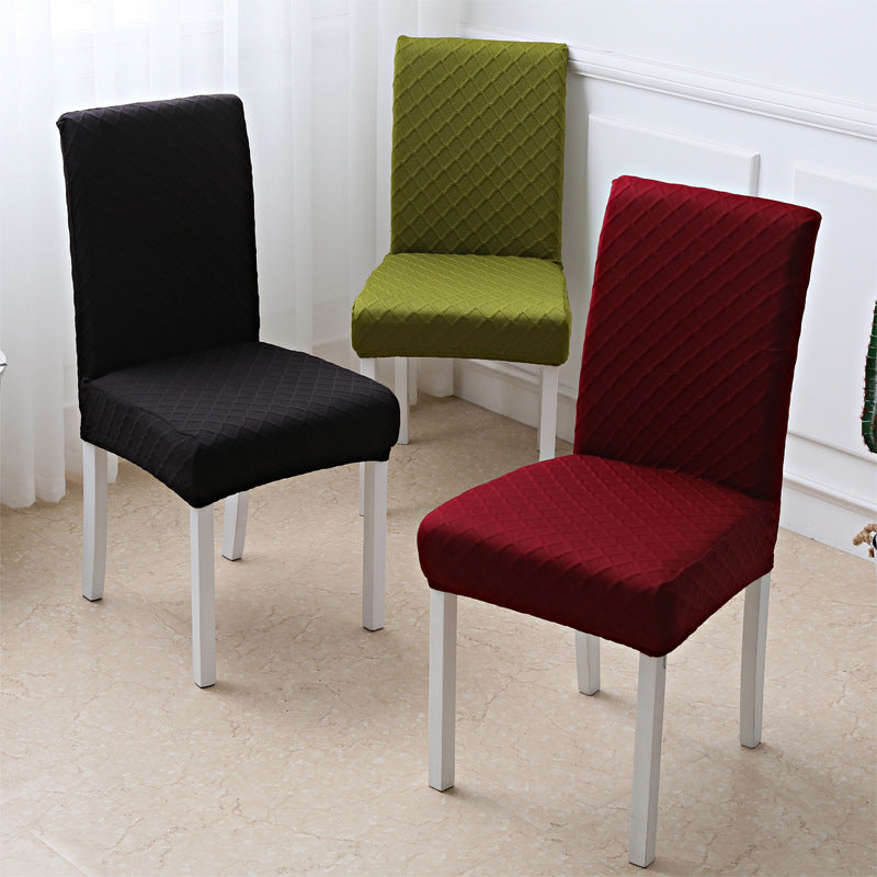 Close view of the woven diamond jacquard texture on a stretch chair cover