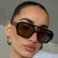Close up of the leopard print frame finish and tinted lens detail