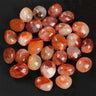 Red gum flower tumbled stone