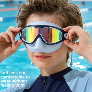 Swimming goggles with a soft silicone seal and adjustable strap in a two tone frame