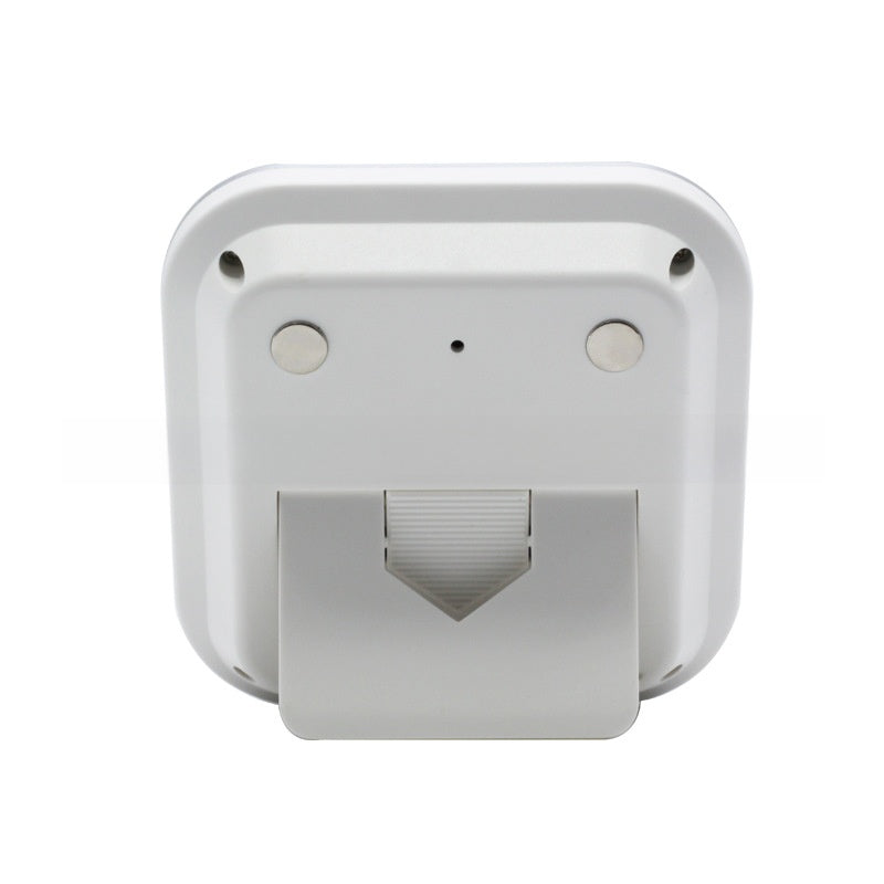 White back of the kitchen timer with two round magnets and a fold-out kickstand extended