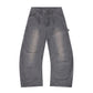 Cream wide leg carpenter pants held in store showing double-knee panels