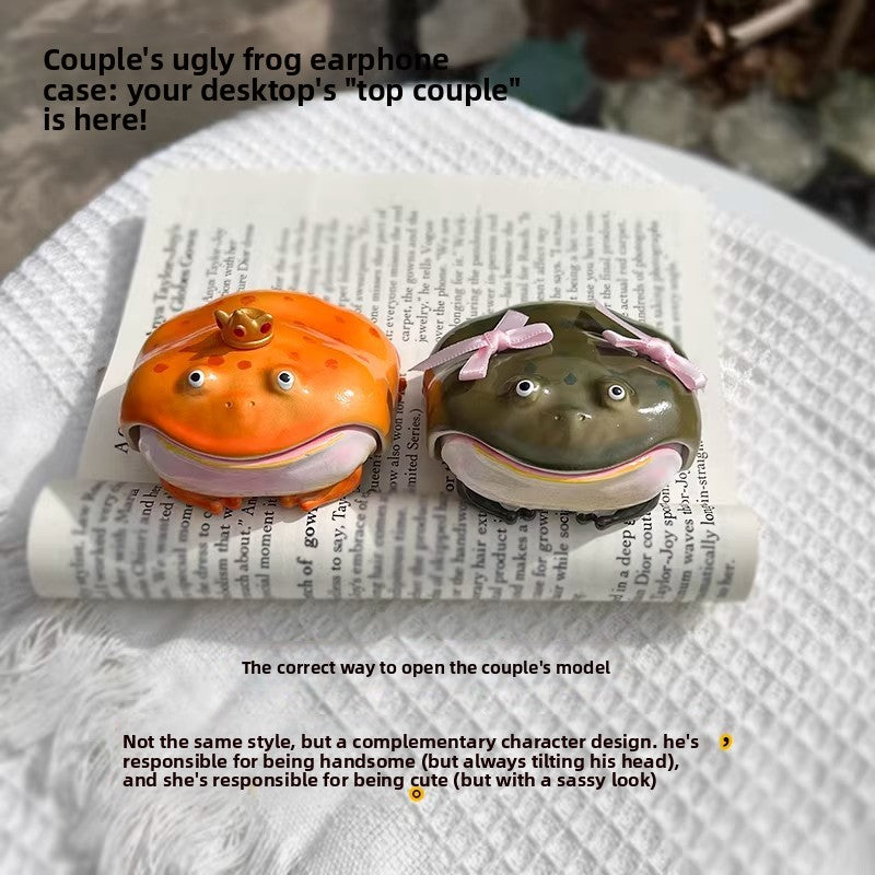 Orange crowned frog case and olive bow frog case side by side on an open magazine