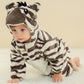 Zebra striped hooded flannel baby jumpsuit with animal hood, baby crawling on a rug