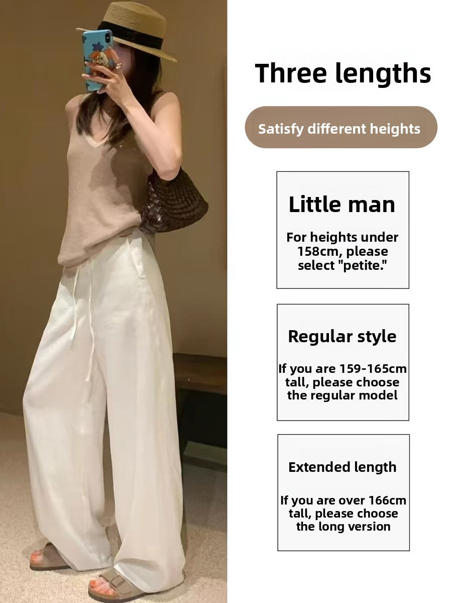 Womens high waist wide leg linen blend drawstring trousers, close up of the drawstring high waist and tie bow