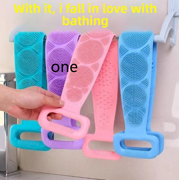 Flexible silicone bath scrub straps in purple, green, blue and pink over a bar