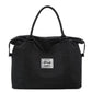 Black nylon weekender travel bag, front view
