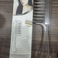 Transparent liquid guide comb resting flat to show the wide teeth and hollow tubes