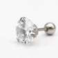 Angled hero shot of faceted zircon stud earrings on stainless steel posts