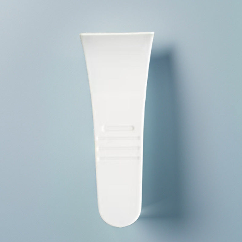 Curved white PP plastic hair removal cream applicator showing the flexible blade edge