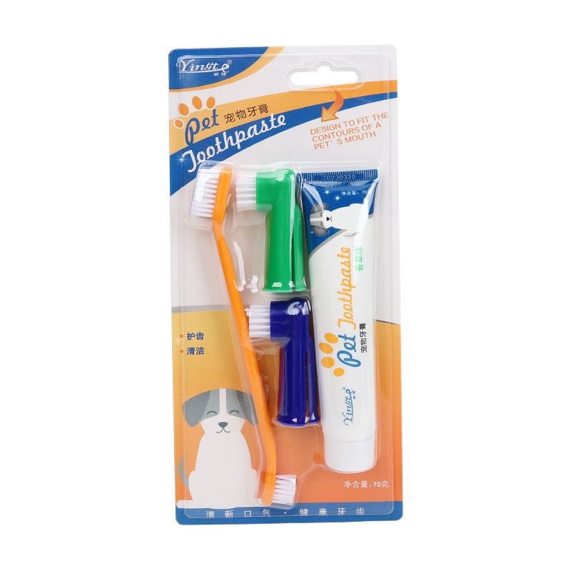 Pet care set with green and blue finger brushes, long brush and paste tube