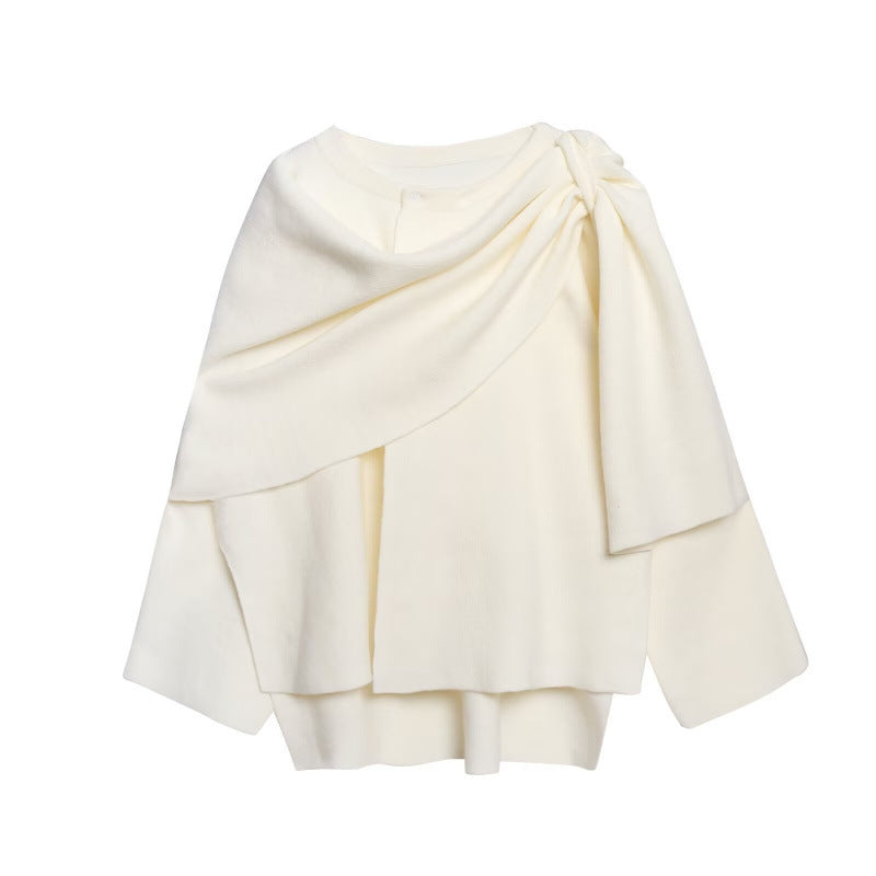 White knitted coat with a draped scarf collar and flared hem