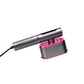 Gray and fuchsia handheld garment steamer with flat steam head and power cord on a white background