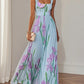 Detail of the pleated fabric folds running down the maxi skirt