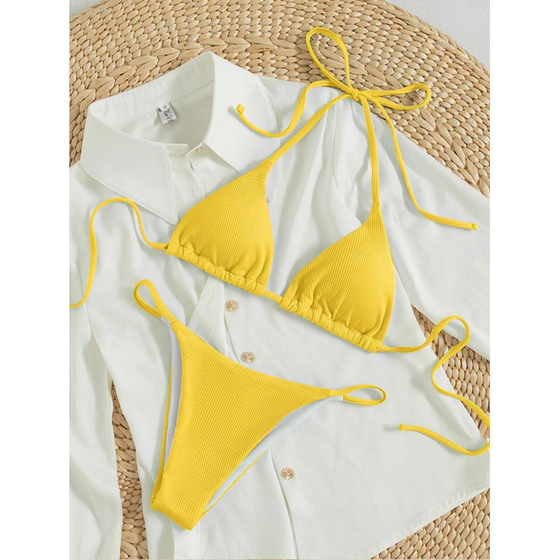 Yellow ribbed halter triangle bikini set with tie side briefs, flat lay, size XL variant