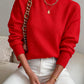 Red half-high neck pullover sweater with long sleeves worn with white trousers, size M variant image