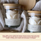 White rose candle in a glass jar, 7 cm wide and 8.5 cm high, English pear and freesia scent option