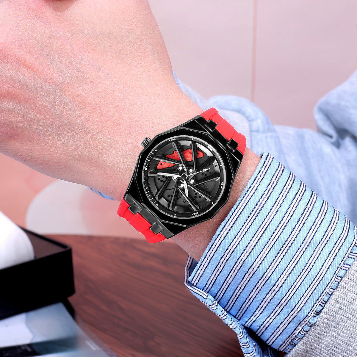 Octagonal car wheel watch shown at a daily wear angle on the wrist