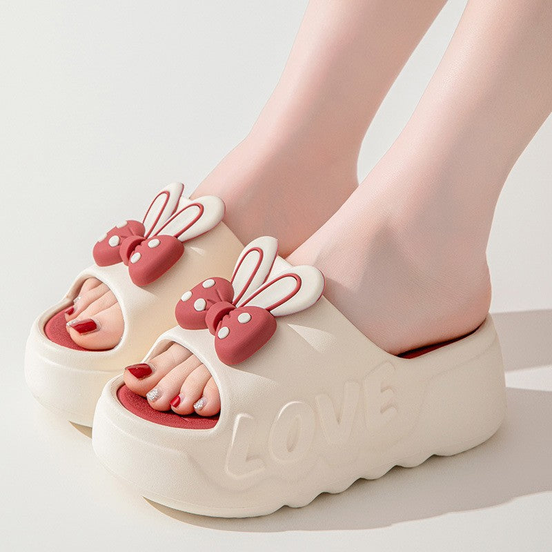 Womens platform slides, red rabbit ear platform slide worn
