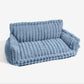 Sofa style plush pet bed with a raised bolster on three sides and a loose cushion, for cats and dogs