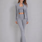 Full length view of the three piece activewear set in one matching colour