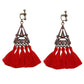 Bohemian vintage clip-on tassel drop earrings on a zinc alloy frame, handmade boho pair on white studio background