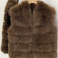Brown tiered vegan fur sleeveless vest on a wooden hanger with a wide V collar and open front