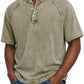 Washed denim henley shown in a colour variant on a plain ground