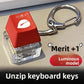 Single red keycap clicker keychain with a steel ring and spring chain