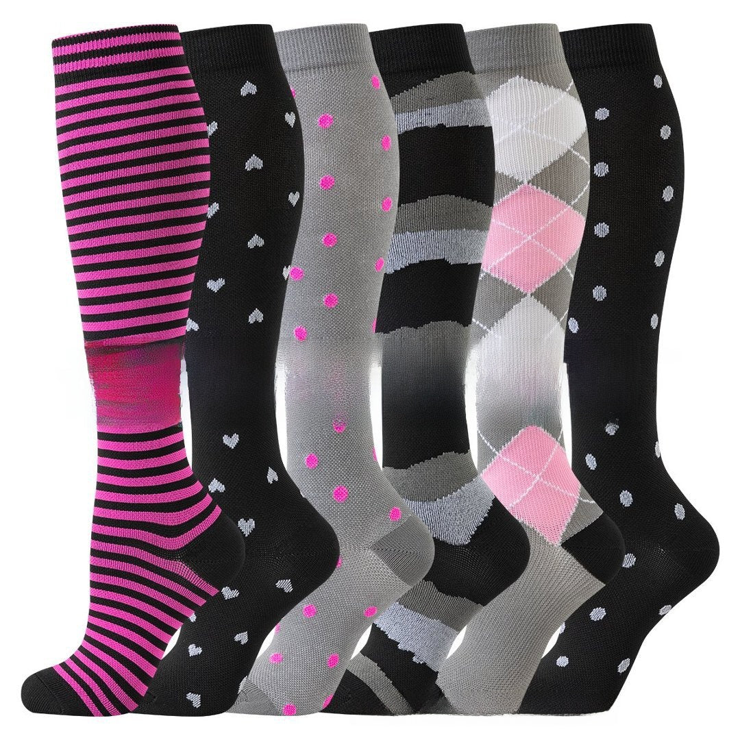 Assorted print knee high compression sport socks laid out side by side