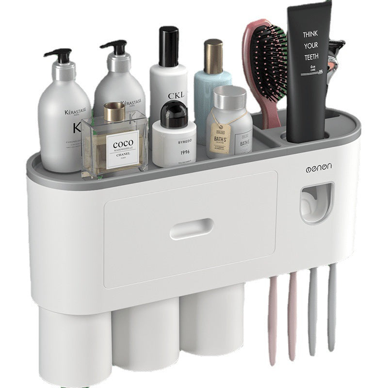 Toothbrush slots under the wall mounted organizer holding several brushes