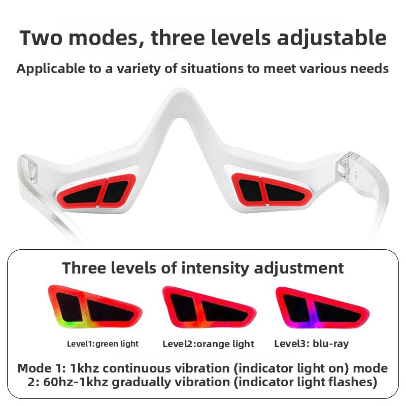 Portable eye massager resting against the brow during a short eye care pause