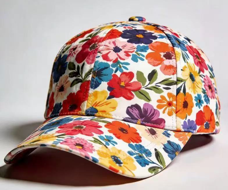 Polyester floral cap with a rounded crown and a short curved shading brim