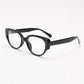 Bright black oval cat eye frame with clear plain lenses seen from the side