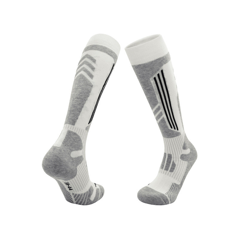 Long ski socks with a towel cushioned sole and an elastic cuff that holds the sock up