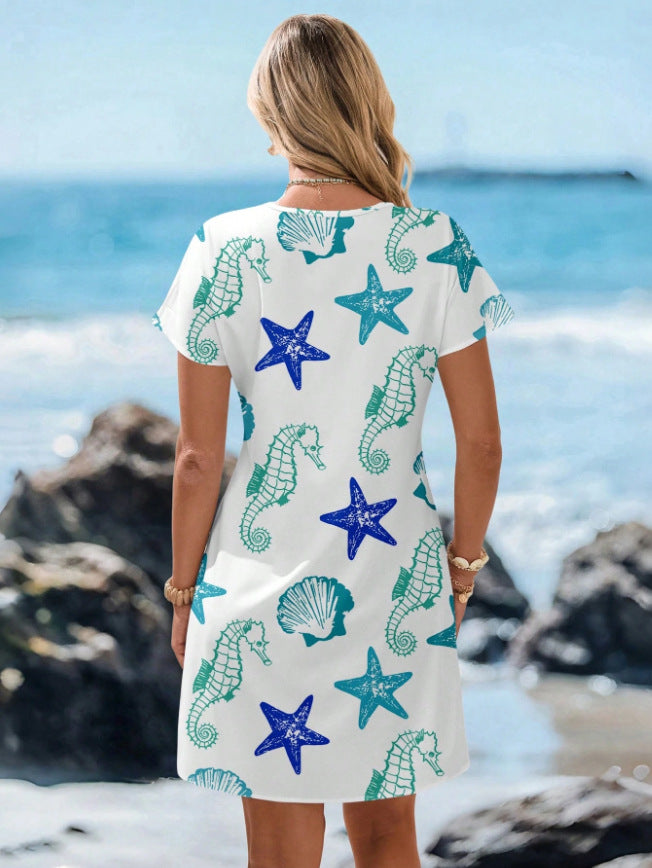 V-neck starfish and seahorse print A-line beach dress, close up of the starfish and seahorse print