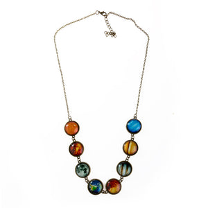Antique bronze tone solar system necklace laid flat on white, eight celestial cabochons in a row with clasp