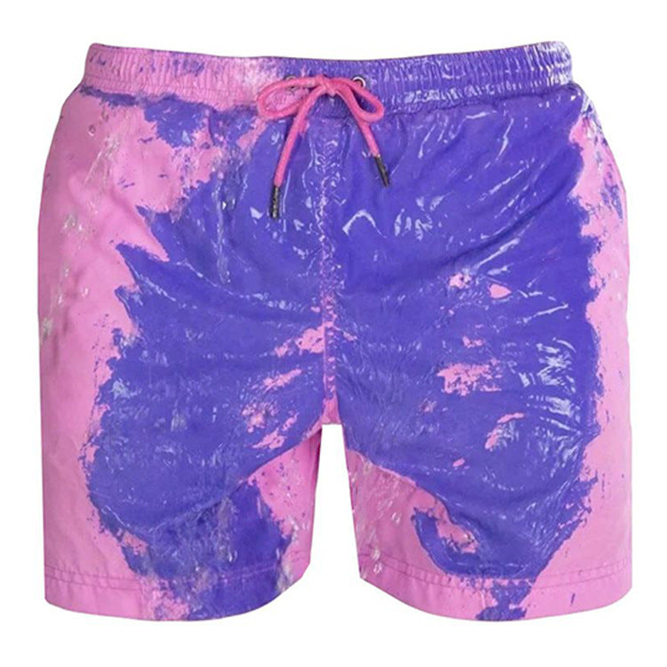 Man wearing the temperature changing swim shorts in a poolside scene