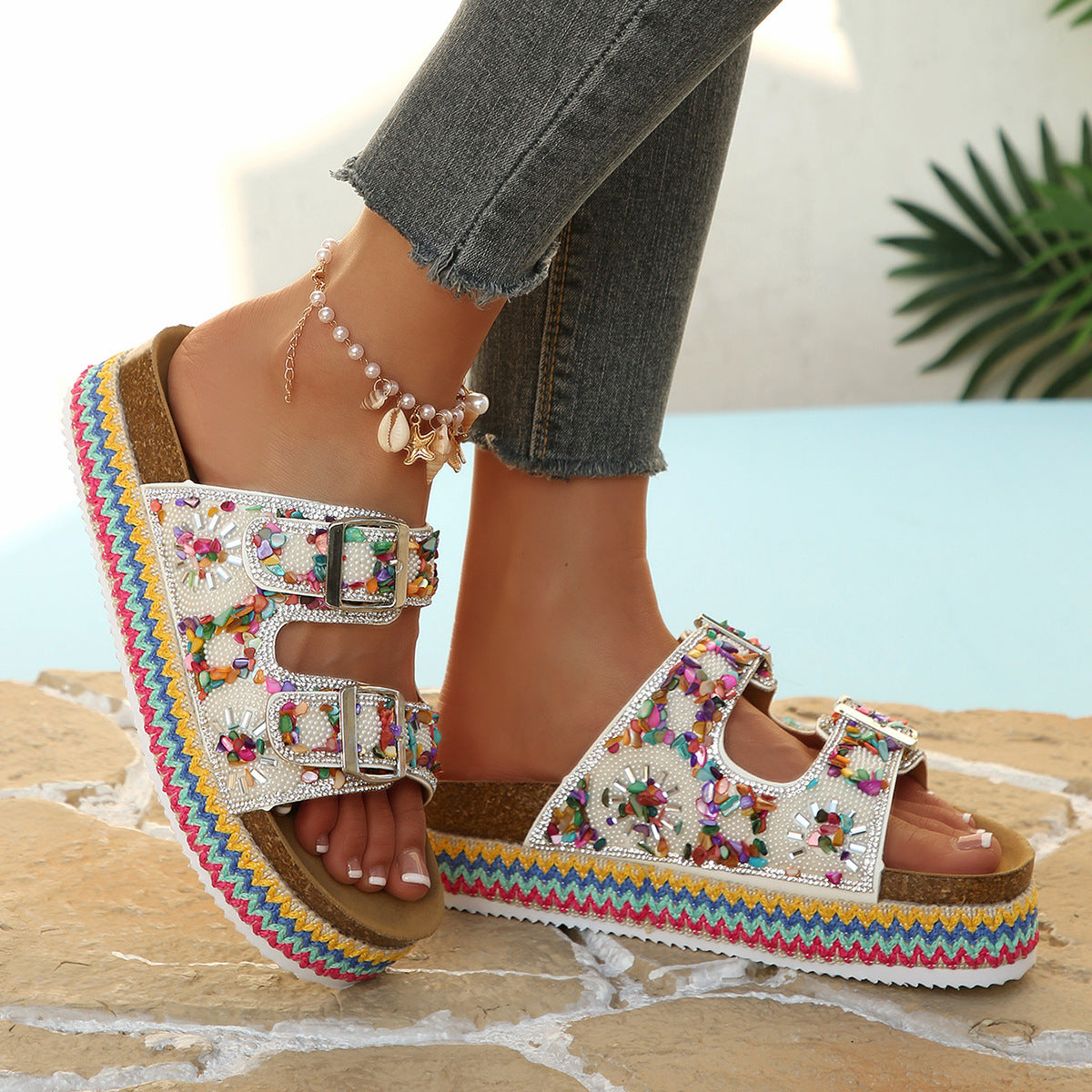 Side view of adjustable buckle ankle strap sandal