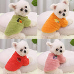 Four small dogs in plush fruit patch sweaters in green, orange, red and pink, shown in a 2 by 2 collage
